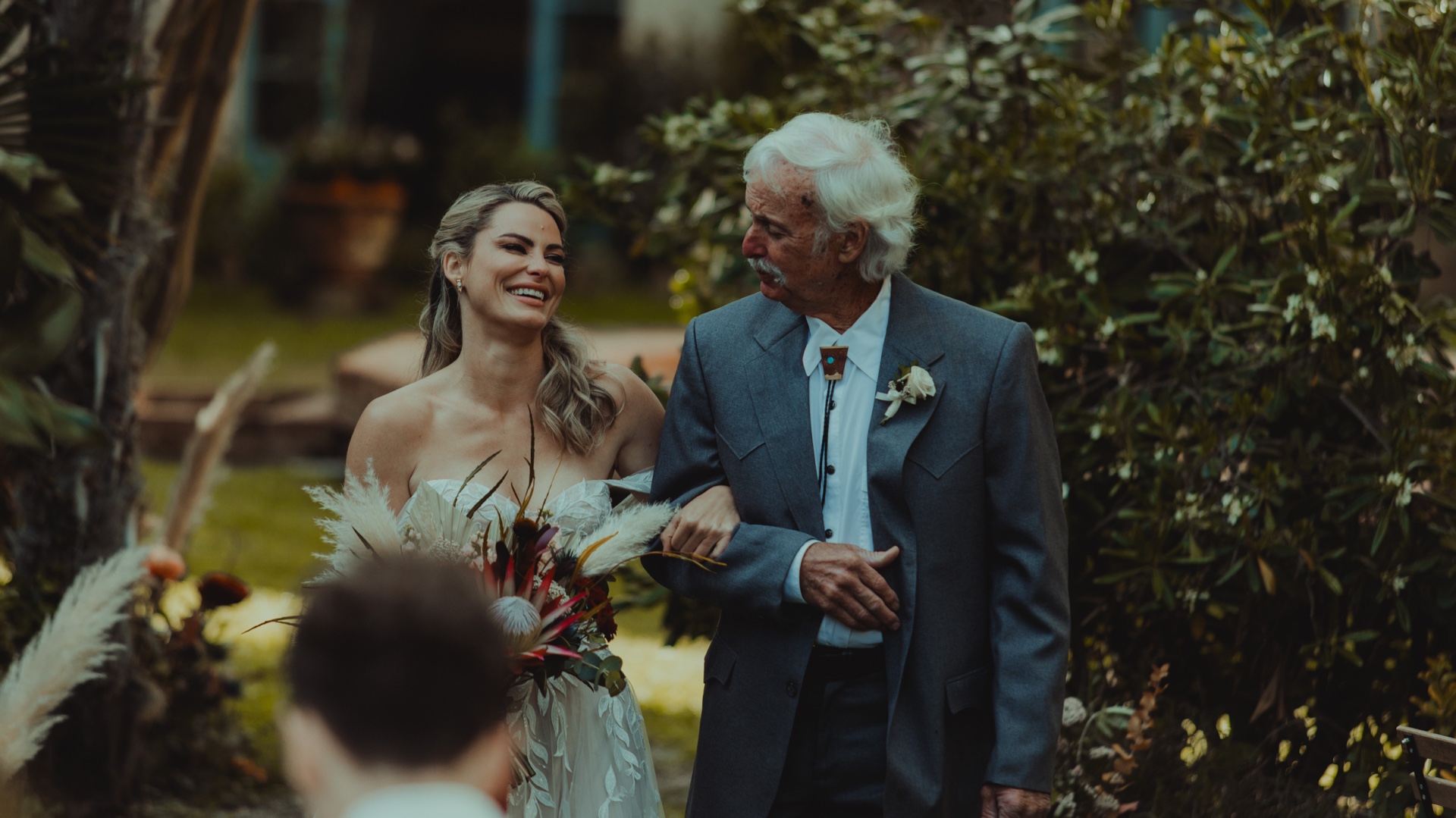 Bride walking down the aisle during her Villa Castelletto wedding